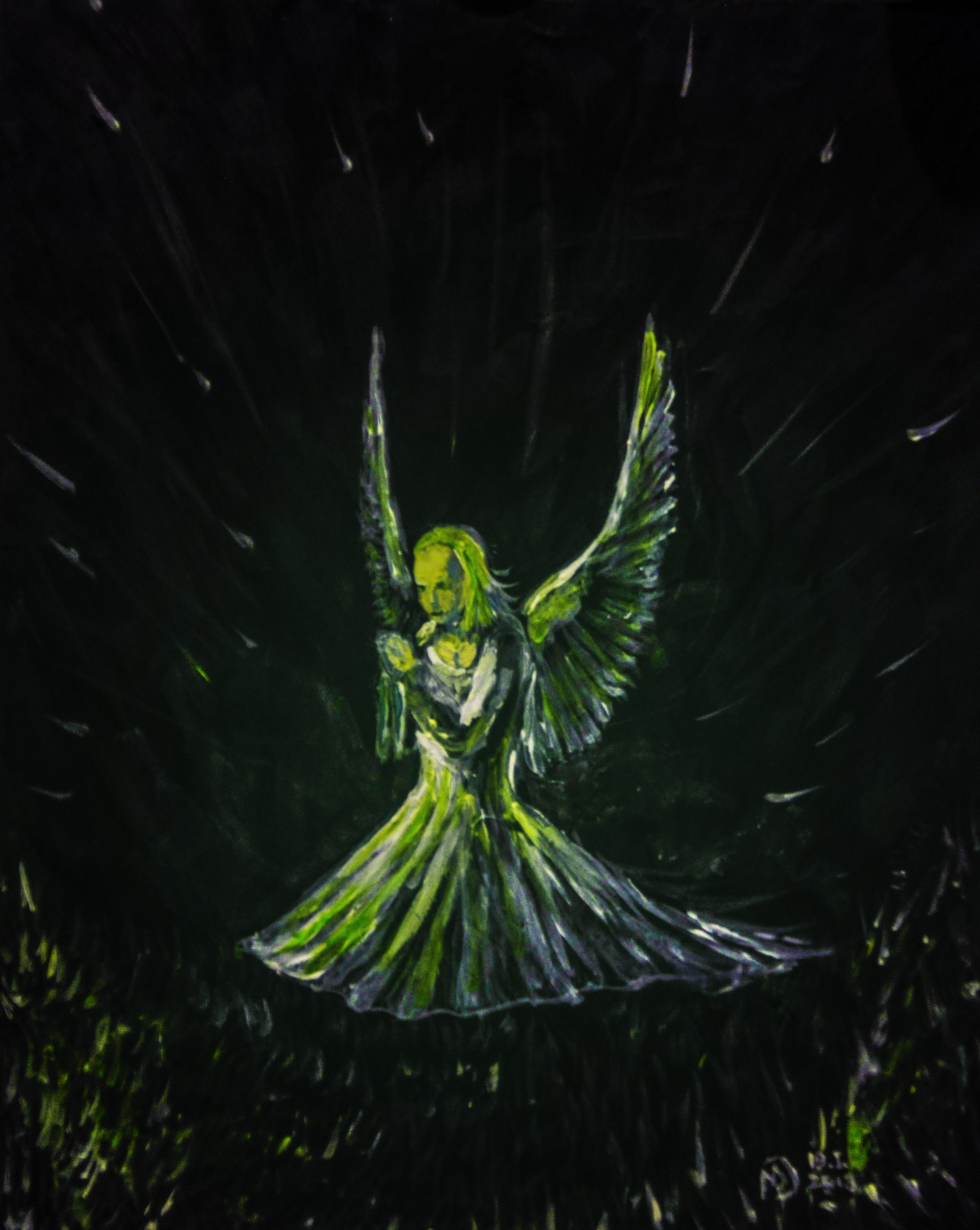 Angel praying on the grass in the night